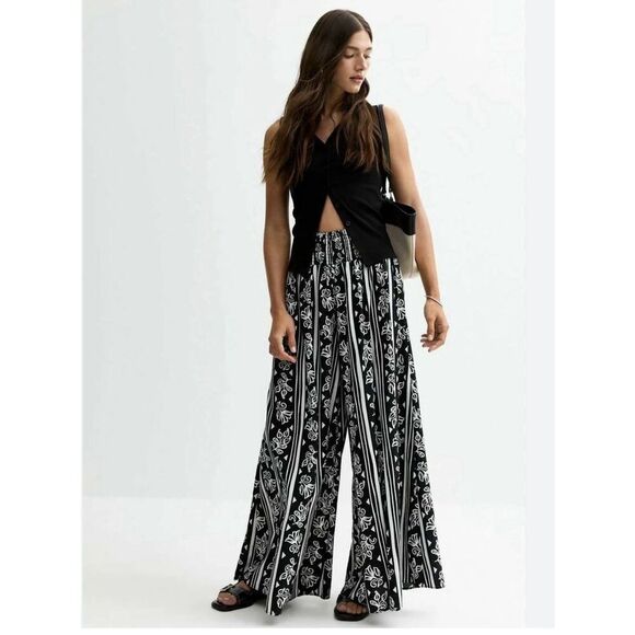 New Look FLORAL PRINT - Trousers - Wide Leg High Rise 2 Pockets Women’s L - Picture 1 of 8